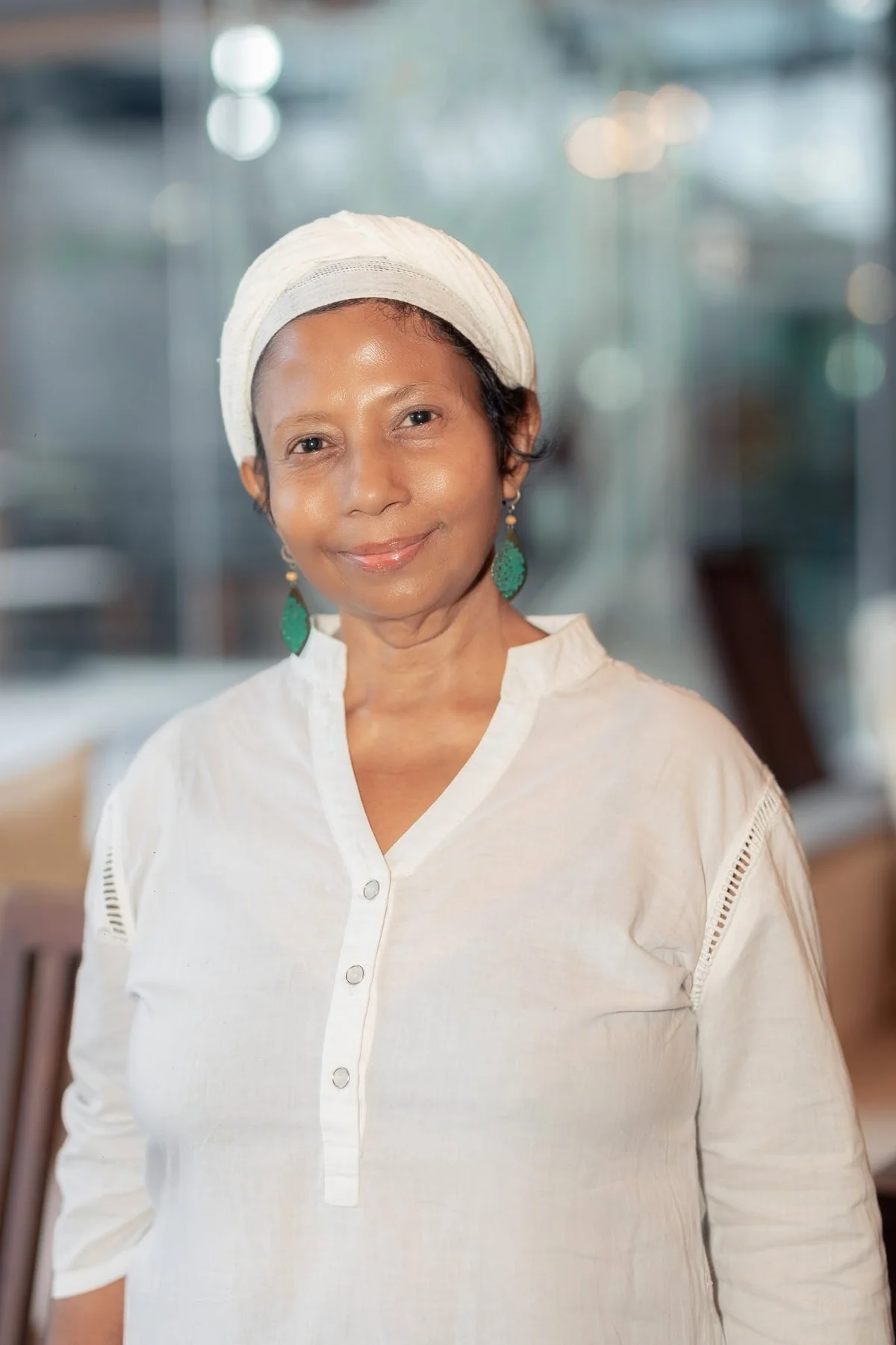 Rizona, founder of REI Holistic Healing Centre